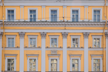 Fototapeta na wymiar windows and details on an exterior of the building. Saint Petersburge, Russia - September 17, 2018.