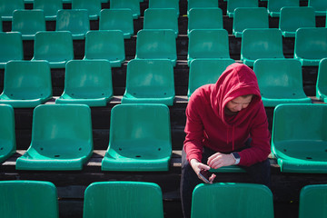 Sportswoman with smart watch count calories. Healthy life concept.