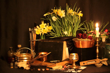 Witchcraft Peacock feathers and candle background.