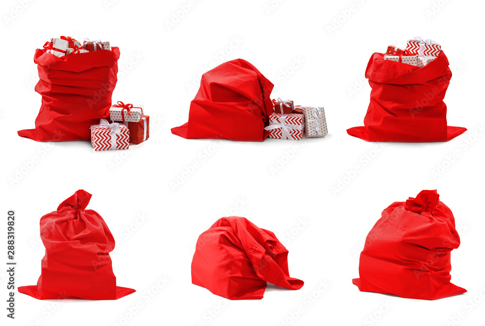 Wall mural Set of Santa Claus red bags on white background