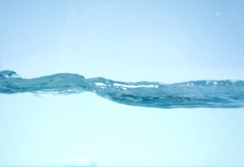 Clear fresh water wave on blue background