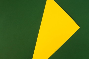 Abstract geometric paper background. Green yellow trend colors mock up. Minimal fashion concept. Flat lay, Top view. Copy space