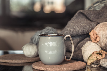 Cozy Autumn still life background with beautiful Cup.