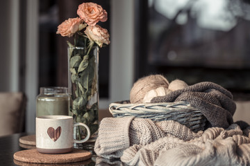 Cozy Autumn background with a beautiful Cup with a heart.