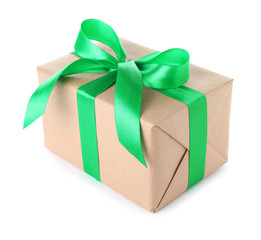 Christmas gift box decorated with ribbon bow on white background