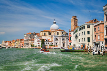 Naklejka premium Boats and gondolas on Grand Canal, Venice, Italy