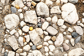 Light stone background with different sizes of stones