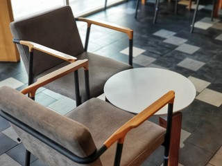 Chairs and round table in the empty coffee shop