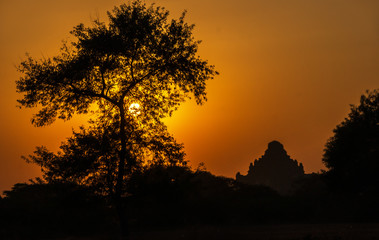 Fototapeta na wymiar Outlines of an ancient buddhist temple in Bagan, Myanmar at sunset