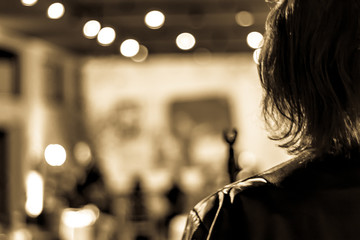 Singer ready to perform on the stage with blur background