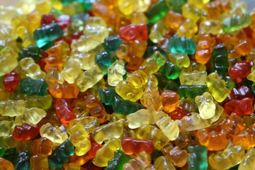 candies with jelly and sugar. colorful array of different childs sweets and treats.