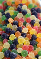 candies with jelly and sugar. colorful array of different childs sweets and treats.