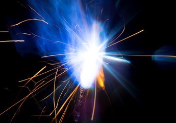 Welding sparks and smoke worker robot