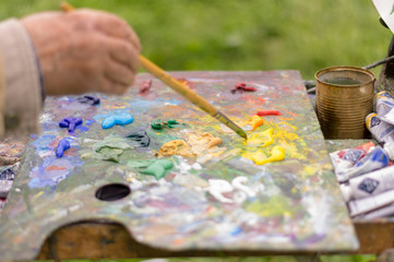 Drawing with oil paints on the nature. Wonderful hobby