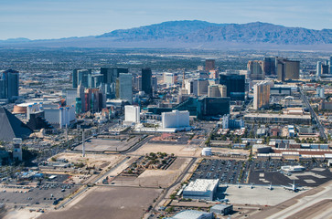 Las Vegas aerial view from aircraft. The Strip skyline and casinos on a summer day, Nevada, USA © jovannig