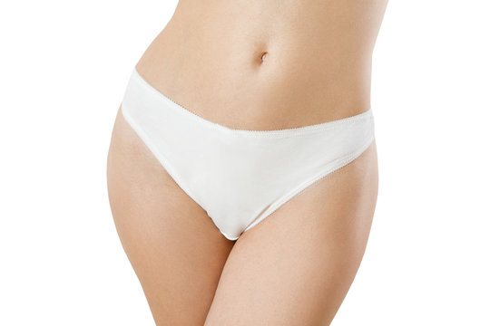 Blank Template White Women Panties Front view mock up. Woman flat belly and good nutrition. Bikini anderwear with shave line and perfect skin. Cropped image. Body care and healthcare. Spa, copy space