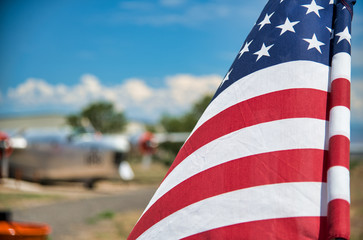 American Flag with airplanes on the background