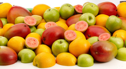 Pile of oranges, Mangos, Apples and Guavas