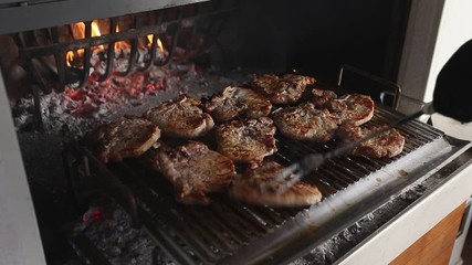 Chops that are turned while cooking on the grill, Italy