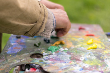 Drawing with oil paints on the nature. Wonderful hobby