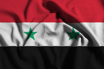 National flag of Syria on a waving cotton texture background
