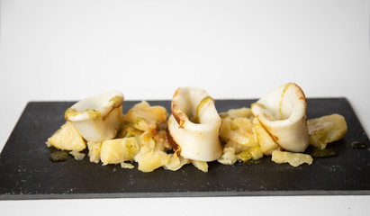 Spanish squid top with potatoes