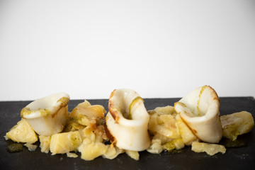 Spanish squid top with potatoes