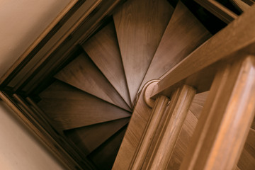 Fototapeta premium Wooden Spiral Winding Staircase in a house