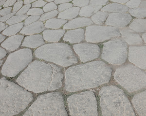background of stones of an ancient roman road