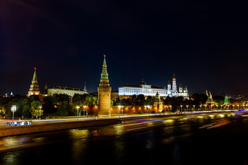 Illuminated Moscow Kremlin, Kremlin Embankment and Moscow River at night in Moscow, Russia.