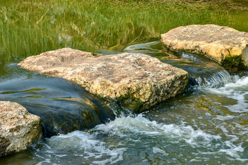 Stepping stones across the river.