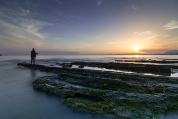 fisherman on sunrise 