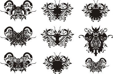 Naklejka premium Tribal snakes and floral elements. Floral twirled snakes symbols in the butterfly form on a white background for your design