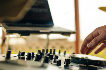 the sound engineer, the buttons on the remote control. Remote control of the sound engineer shallow depth of field. Vintage photo processing
