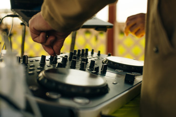 the sound engineer, the buttons on the remote control. Remote control of the sound engineer shallow depth of field. Vintage photo processing