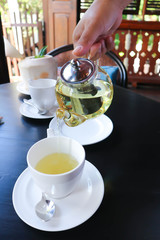 tea or hot tea, pouring tea