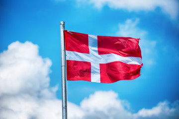 Danish flag fluttering in the wind on a flagpole