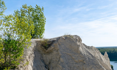 The Rummu quarry is a submerged limestone quarry located in Rummu, Estonia. Much of the natural area of the quarry is under a lake formed by groundwater, and is situated next to a spoil tip