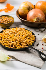 Crispy Fried Onion Strings Background. Selective focus.