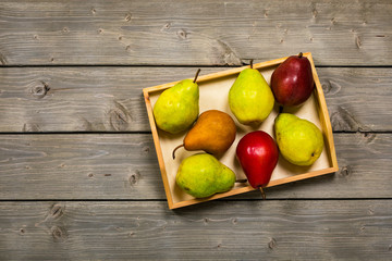 Fresh Ripe Organic Pears on a Wooden Table. Selective focus.