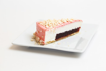 piece of cake on a plate on white background