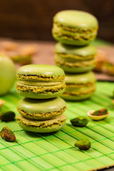 Green Pistachio Macaron Cookies Background. Selective focus.