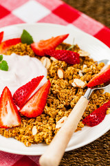 Strawberry Cinnamon Granola Yogurt Breakfast. Selective focus.