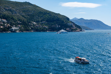 ship enters the bay of Thira (Santorini)