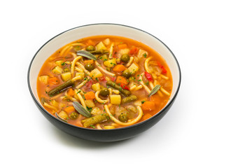 Vegetarian Vegetable Soup Isolated on a white background. Selective focus.