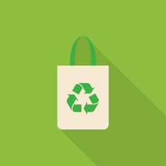 Fabric bag icon with recycle symbol with long shadow on green background, flat design style