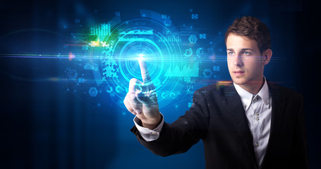 Man touching hologram screen displaying medical symbols and charts