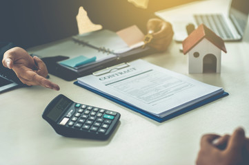 Businessman and customer home buyer had achieve target means together