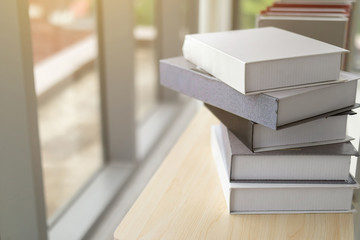A close up of a book on a wooden floor