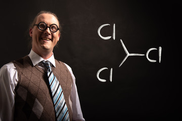 Professor presenting handdrawn chemical formula of trichloromethane cloroform